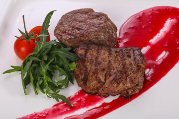 Beef steak with berry sauce