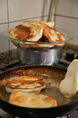 Pan-fried pastry. Baking pastry in the pan. Turkish pastry type bagel 