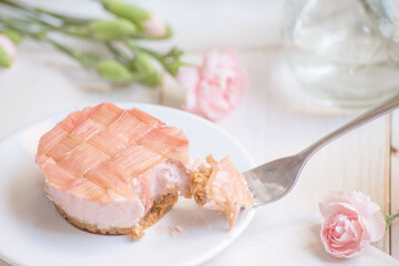 Mini pink rhubarb desserts and flowers