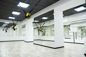 Interior of an empty gym for stretching classes.