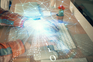 Businessman with computer background with technology theme hologram. Concept of big data. Double exposure.