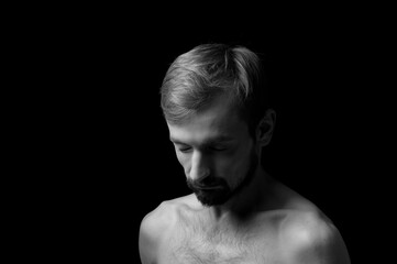 Naklejka premium black and white photo portrait of a young man