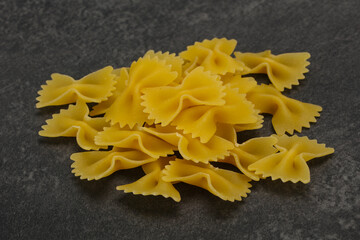 Raw dry farfalle pasta for cooking