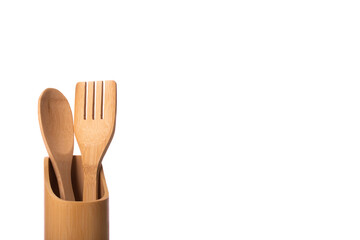 wooden bamboo kitchen utensils. Two pieces in stand. kitchen spoon and spatula isolated on white...