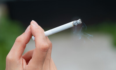 hand with a cigarette close up