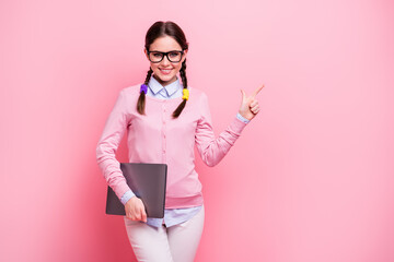 Portrait of her she nice cheerful confident brown-haired teenage girl holding in hand laptop...