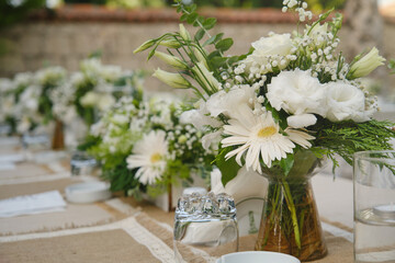 Dining table decoration. Dining table decoration in the garden. Invitation dinner, wedding dinner, engagement dinner