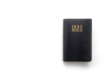 Holy Bible on white with copy space