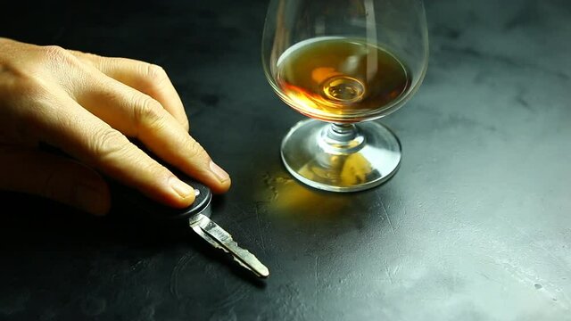 drunk man taking car key  and his friend stopping him, Don't drink and drive concept.