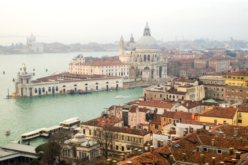 Obraz premium Panorama with the red roofs, Adriatic sea and the most impressive historical buildings of the old romantic Venice, Italy