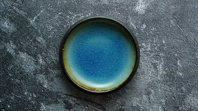 Handmade brown and blue glaze rustic pottery bowl