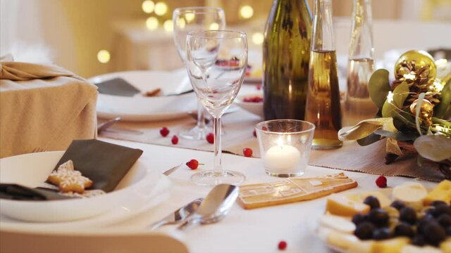 A table set for dinner meal at Christmas time.