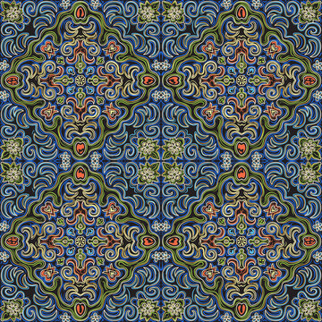 abstract seamless pattern from gold and colorful curly stripes, flowers and shevron on a black background. Ikat print, geometrical textile design, wallpaper, wrapping paper, carpet