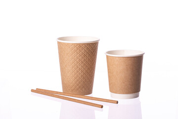 set of take away disposable paper coffee cup with paper straws isolated on white background. Plastic pollution reduction concept. Zero waste concept.