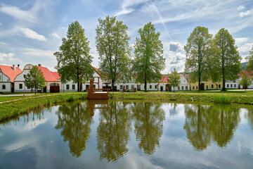 Colorful village houses in South Bohemian folk or rural baroque style. UNESCO World Heritage Site,...