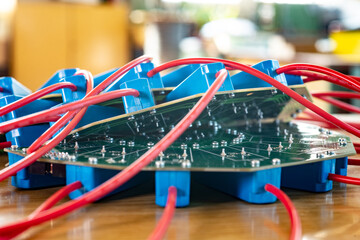 Close-up of a large green microcircuit with blue components