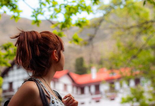 Beautiful girl seeing the wonderful Villavicencio hotel.