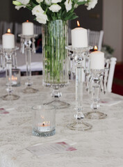 wedding decor. wedding table setup. Candels and white flowers