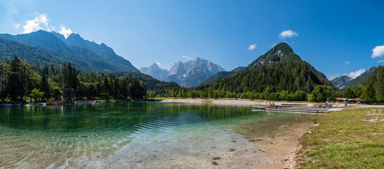 Stunning panorama view over Lake Jasna, Kranjska Gora, Slovenia, with the Alps in the background