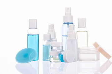 Beautician products kit, professional cosmetic fluids for skin care and cleaning mask or peeling isolated on white background. Skin care, pure beauty, body treatment concept