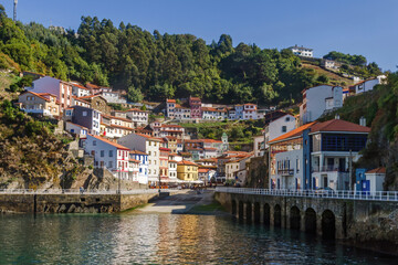 Fototapeta na wymiar Coastal and tourist town of Cudillero with terraced houses. North of Spain fishing village