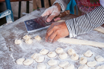 Kneading dough to make fried patongo