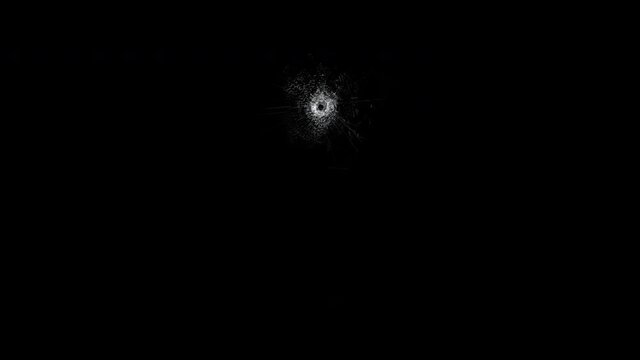 Gunshot hole mirror crack.