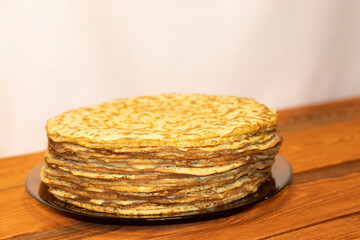 Zucchini pancakes on a wooden table.