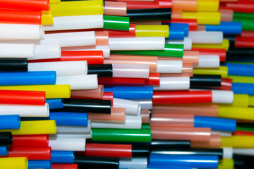 close-up on multi coloured  plastic  drinking straws . selective focus
