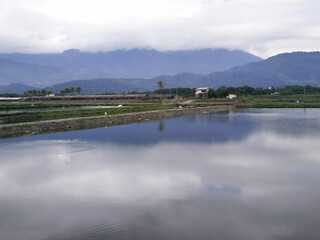 There is a calm blue lake