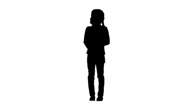 Silhouette Little girl wearing protective face mask taking deep breaths looking at camera.