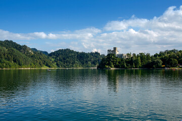 Fototapeta na wymiar beautiful calm waters of the Czorsztyn Lake and Niedzica Castle, Poland