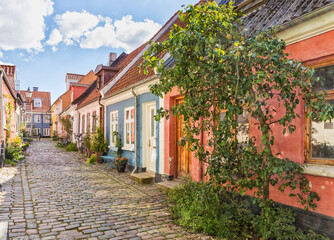 Idylic cobbled street at the old town of Aalborg, Denmark
