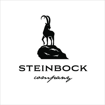 The Alpine ibex stands on the edge of a cliff in a classic style design