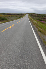 The twisting road along the coast of the Barents Sea, Varanger national scenic route in Finnmark, Norway