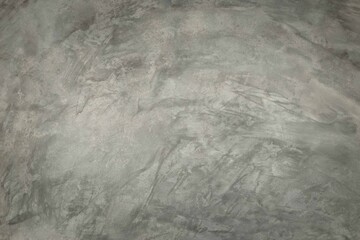 The cement wall shows the pattern of the building's wall and is painted with liquid solution.