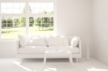 White living room with sofa and summer landscape in window. Scandinavian interior design. 3D illustration