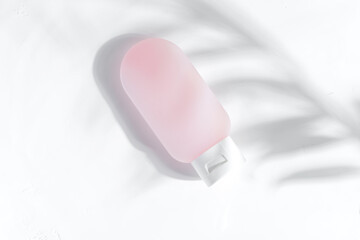 Plastic bottle with cosmetic natural cleaning lotion.
