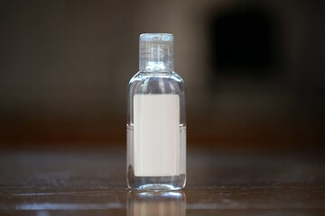 Alcoholic hand sanitizer gel in a small bottl