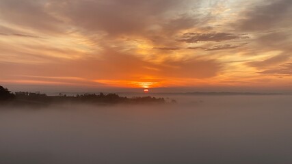 Naklejka premium Foggy Sunrise