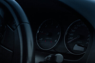 car dashboard with speedometer and car