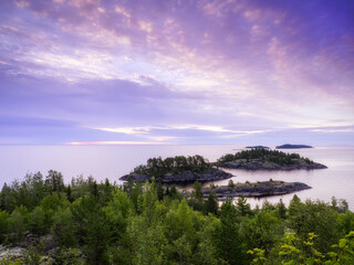 Island shore on lake Ladoga. Summer landscape. Wild nature