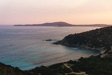 Panoramic landscape sunset view at rocky ocean coastline, Capo Testa, Sardinia, Italy