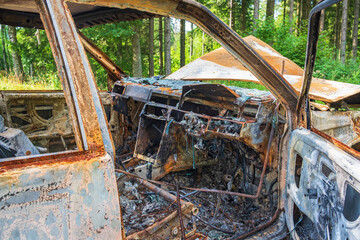 Interior of a burned-out car from the driver's side