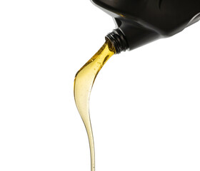 Pouring fresh automotive engine oil (lubricating oil, yellow liquid oil) into a motor car isolated on white background. Change new oil. Maintenance, service, and energy fuel concept. .