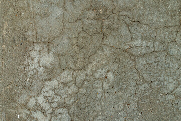 Old Concrete Wall with Scratches, Scuffs, Cracks, Stones. Good Background for Creativity