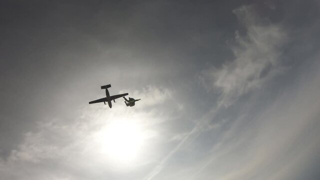 Skydiving. Tandem jump. The start of the flying near the Sun.
