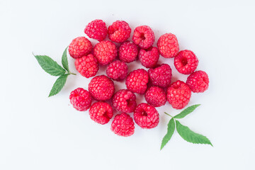 appetizing raspberries on a white background, a bunch of juicy ripe fresh berries