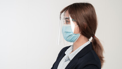 Businesswoman with face mask and Face shield  Woman  wearing protective mask. Corona virus protection.