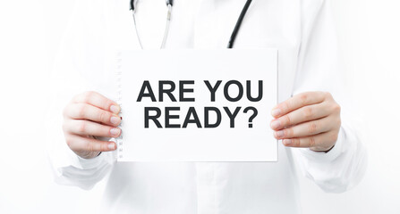 ARE YOU READY message on the card in the hands of a doctor.